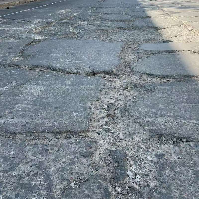 红旗路面起砂露石子修补料